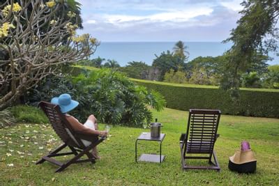 Woman reclining in Trinidad garden