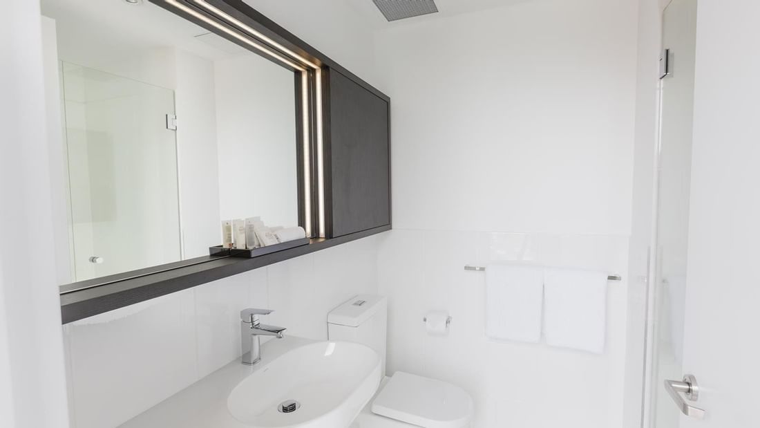 Bathroom vanity and lavatory in Standard Room Two Single Beds at Ibis Adelaide