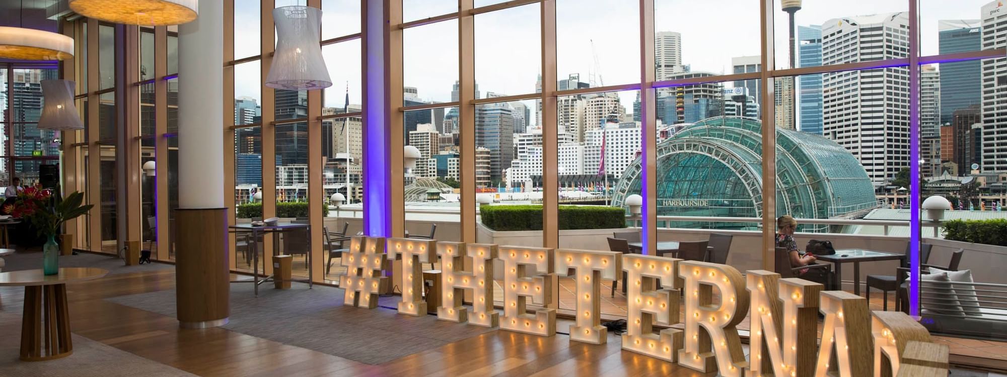 Event space with lighted letters in Events by Ternary at Novotel Sydney on Darling Harbour