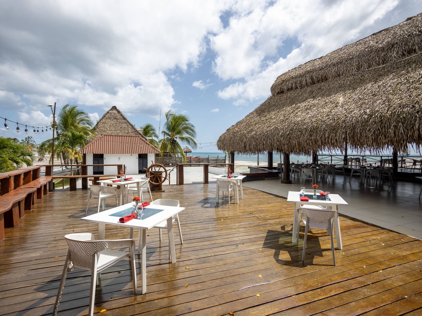 Outdoor tables in Velero Restaurant at Playa Blanca Beach