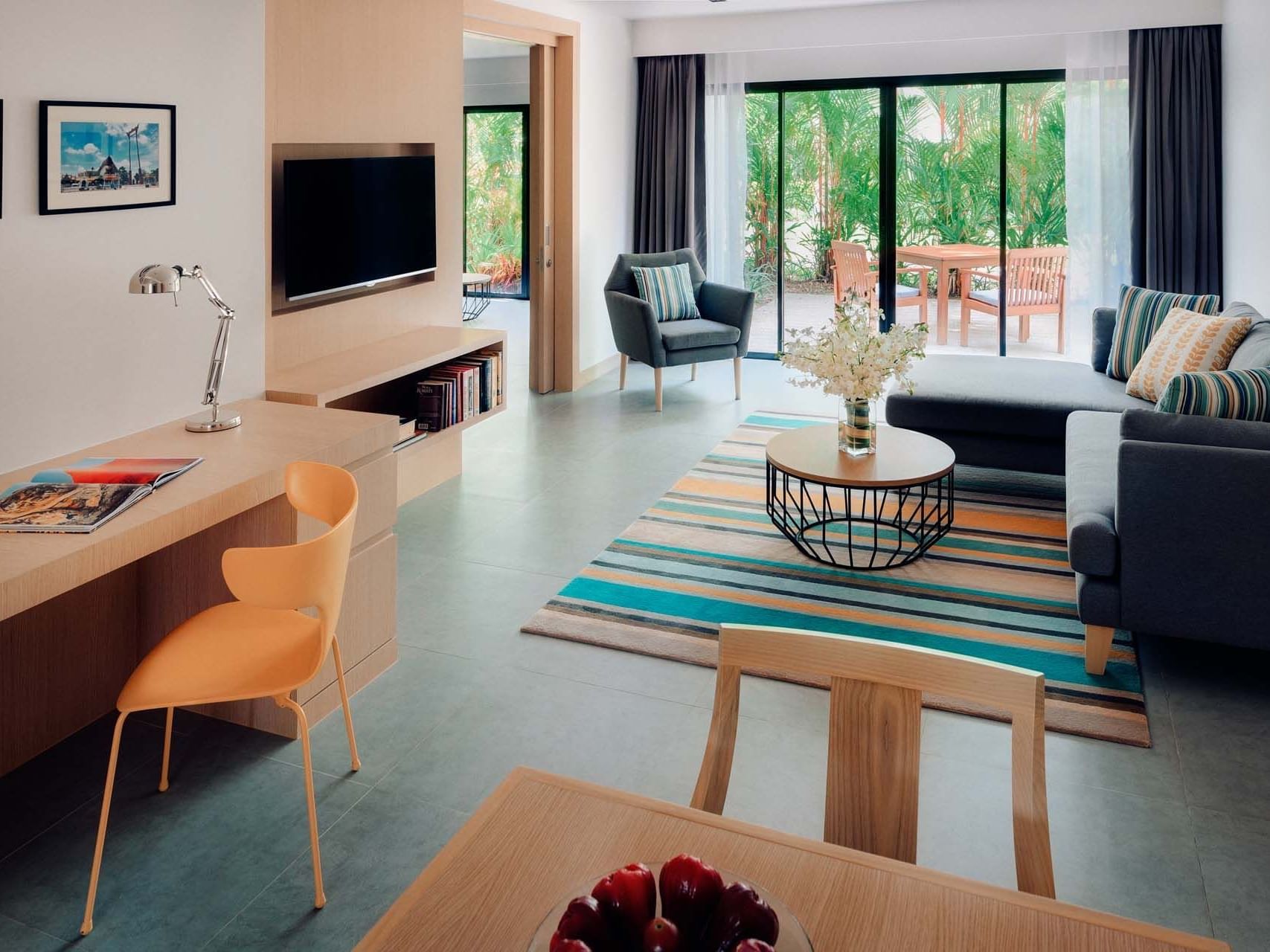 Living area in a Two-Bedroom Suite at Paradox Hotels & Resorts