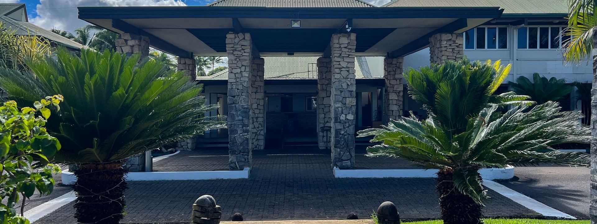 Front entrance of Tokatoka Resort in Nadi with tropical landscape at Tokatoka Resort - Fiji International Airport