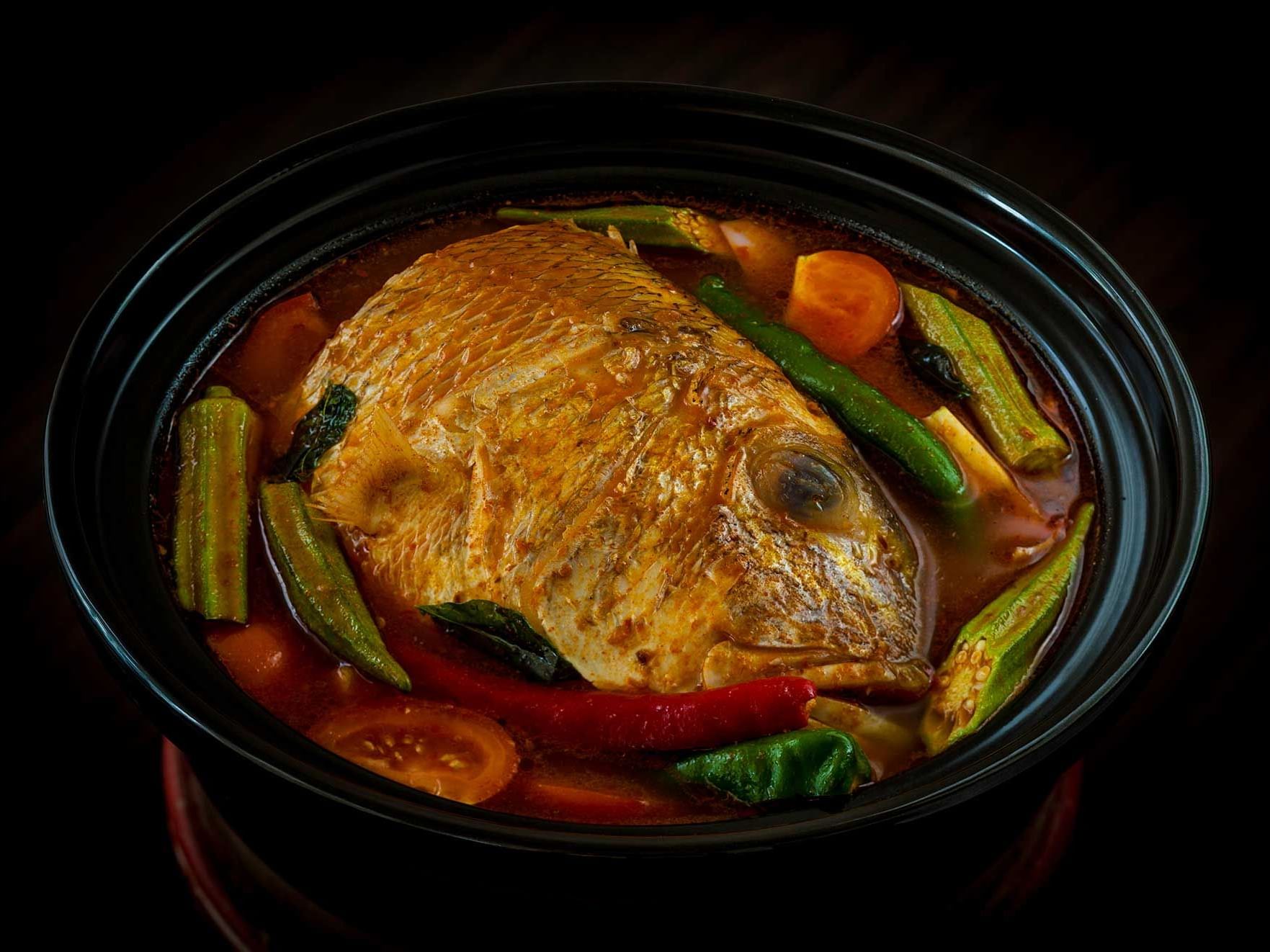 Fish head curry served in White Rose at York Hotel Singapore