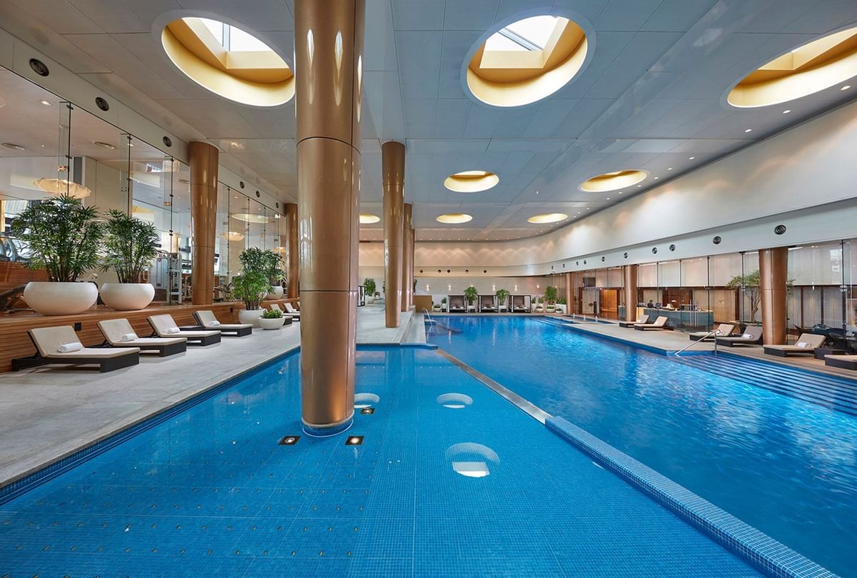 Lounges by the indoor pool at Crown Metropol Melbourne