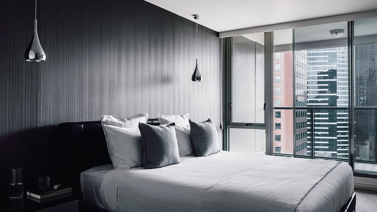 Comfortable bed room at Sebel Quay West Suite melbourne	