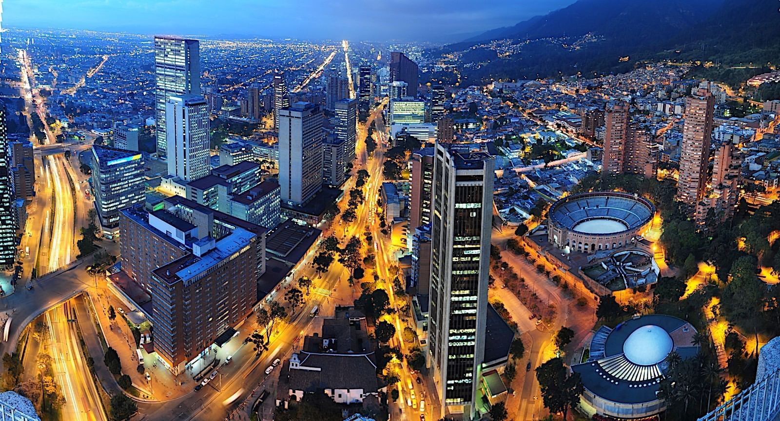 Birdseye view of the city at night near Blue Doors Hotels