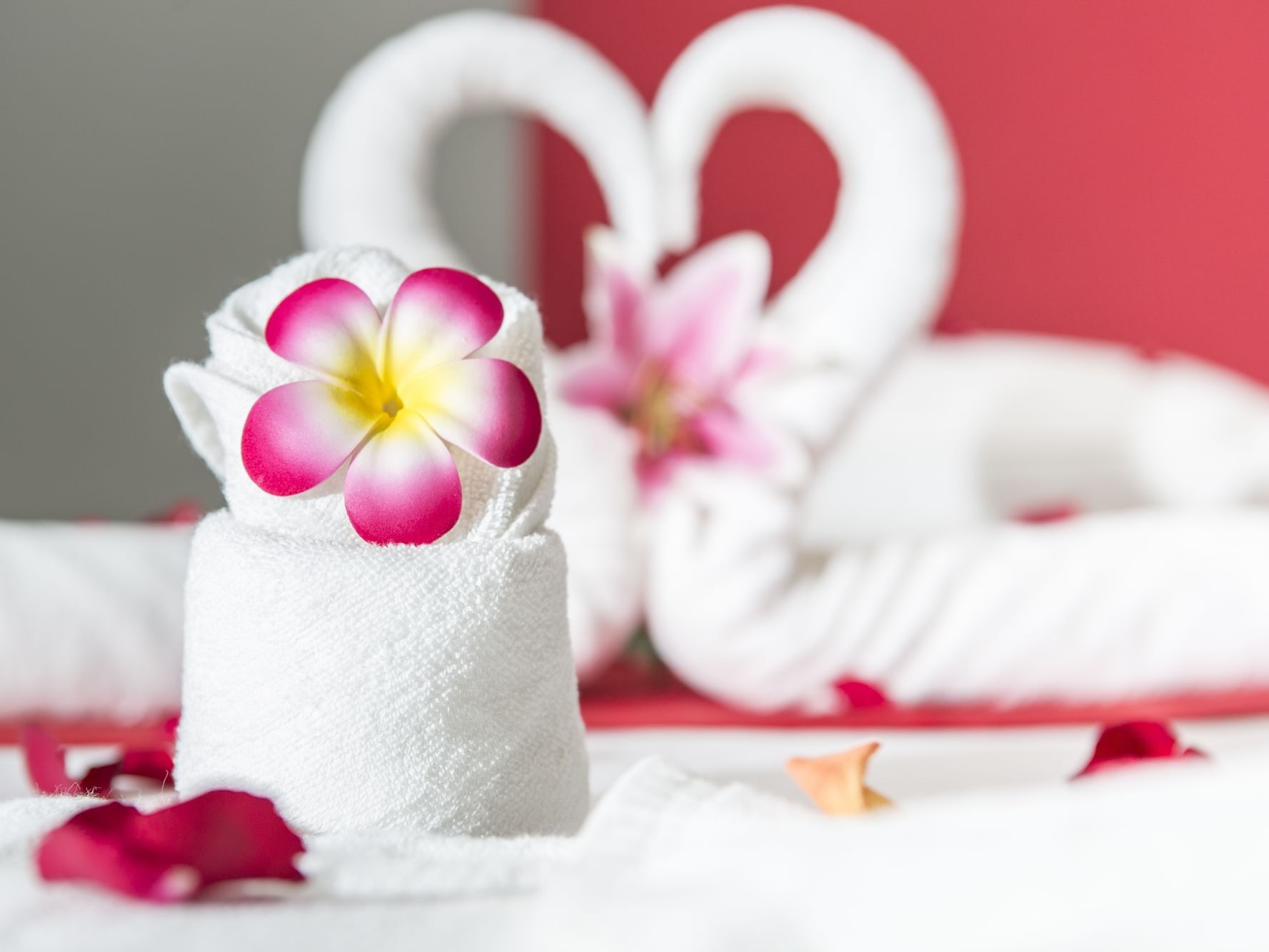 Rolled towel with a flower