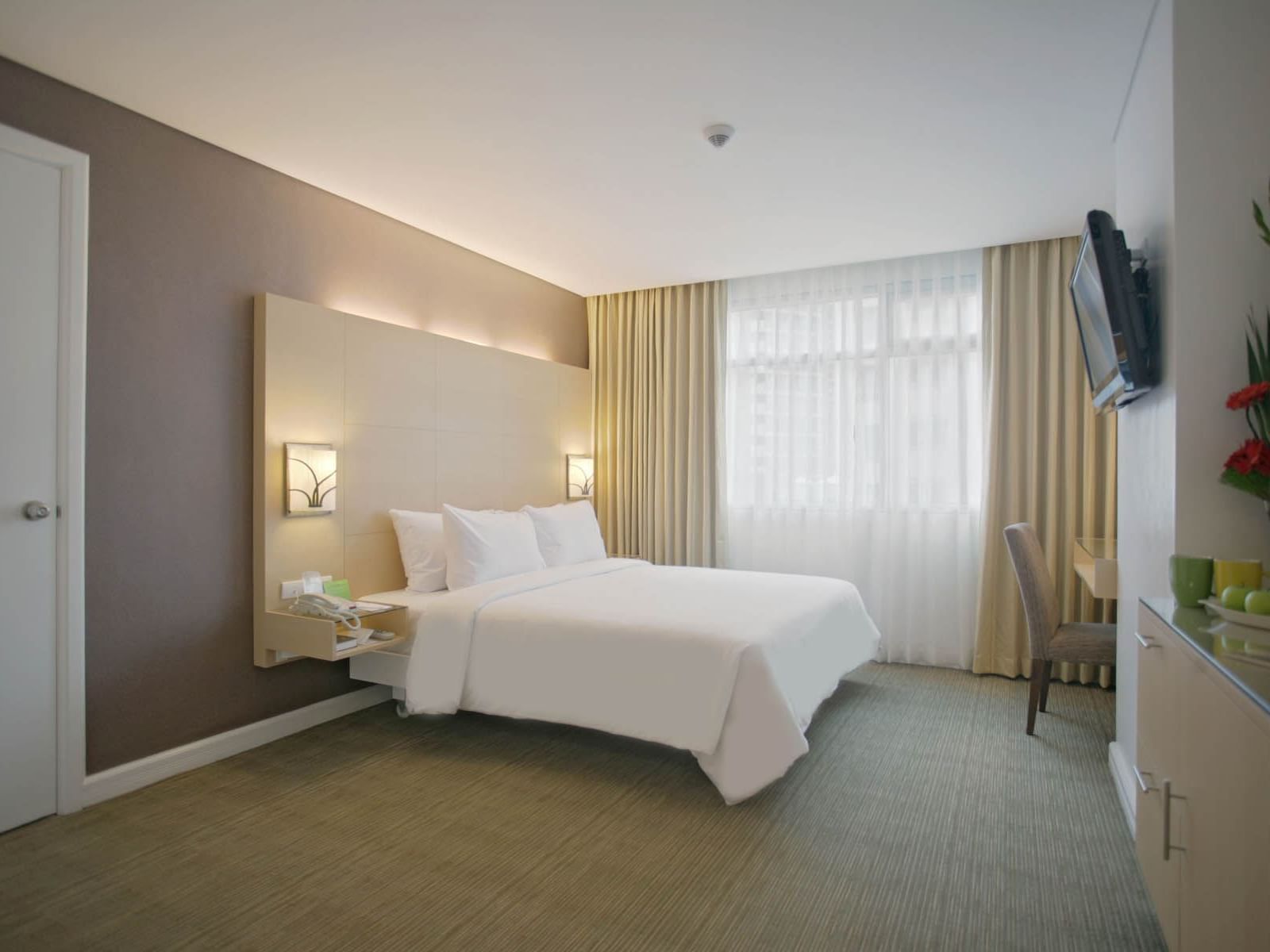 Interior of Deluxe Rooms with king bed at St Giles Makati Hotel