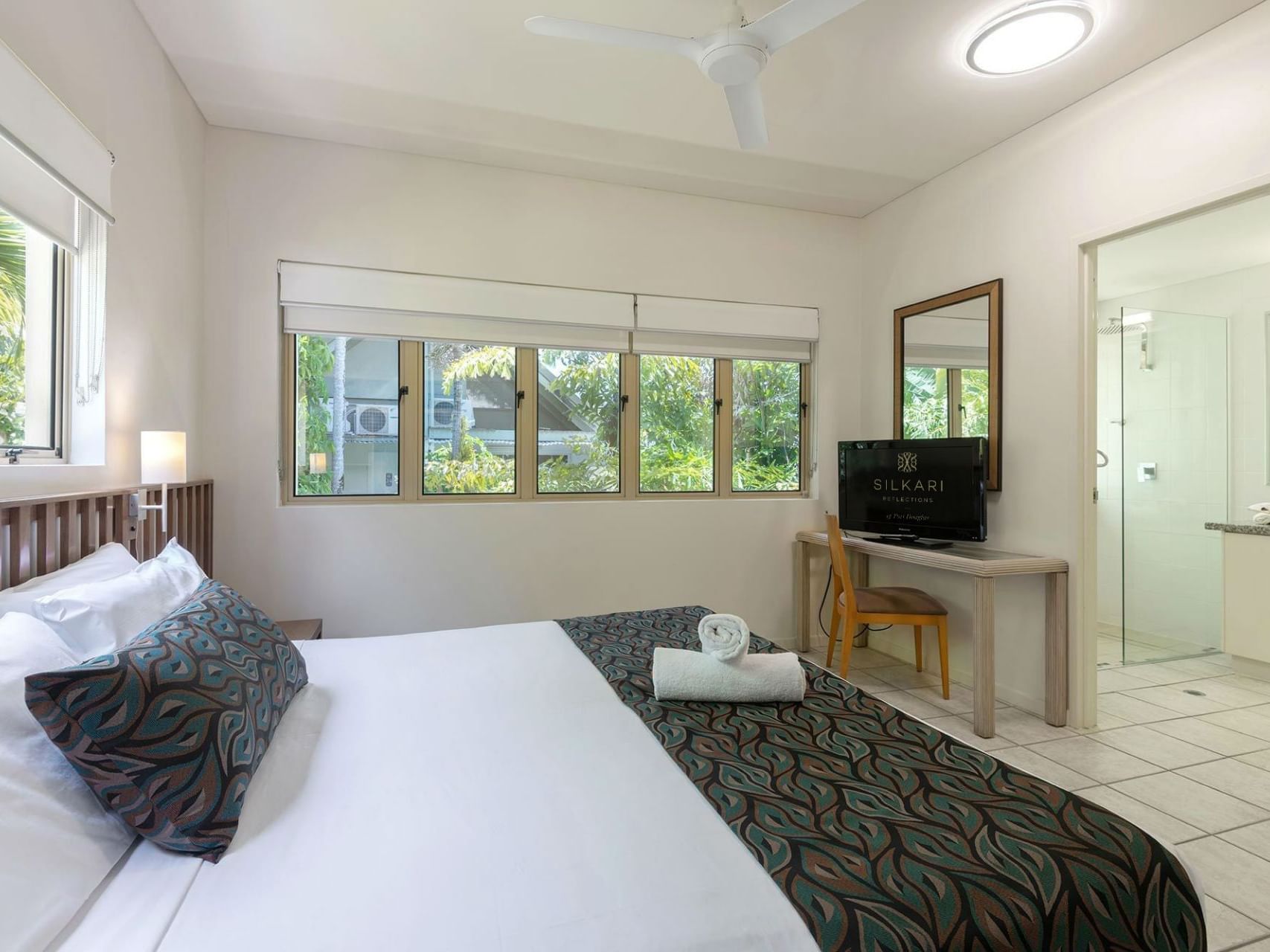 King bed in 3 Bedroom Superior Apartment at Silkari Reflections