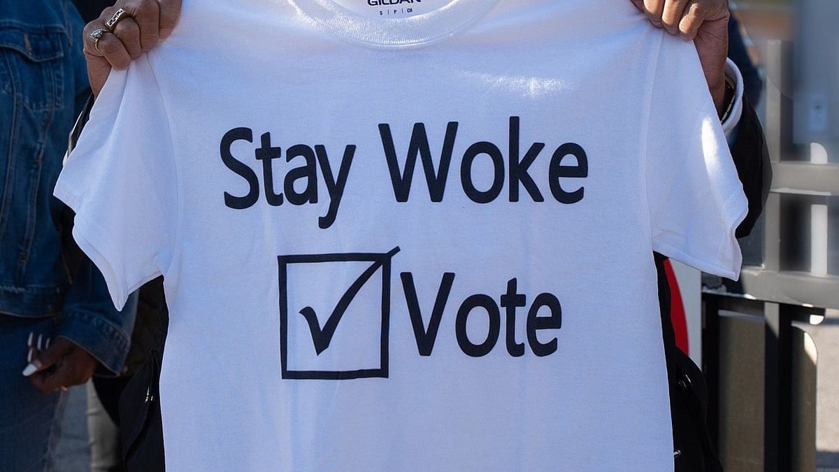 A person holding a white t-shirt at Legacy Vacation Resorts