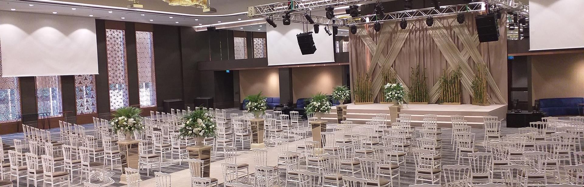 Theatre-typed event hall arranged with chairs in Karina at Titanic Business Kartal