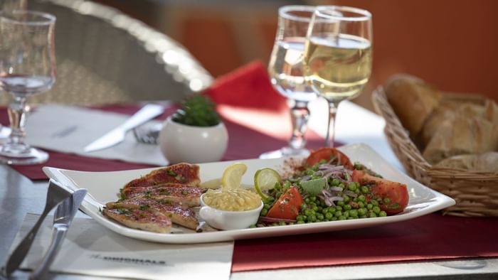 Closeup of Meals served with wine at Relax'Otel