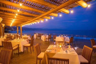 Dining table set-up at night at Buenaventura Grand Hotel