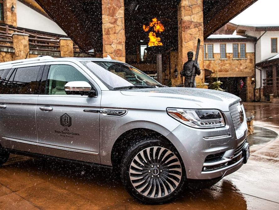 Lincoln Navigator with the hotel sign at Stein Eriksen Lodge