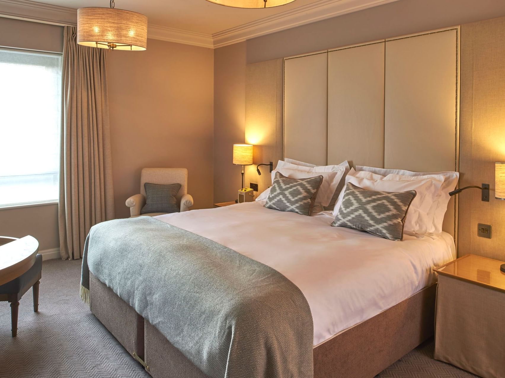 Lounge & lamps by the king bed in Superior King Room, accommodation in York city centre at The Milner York