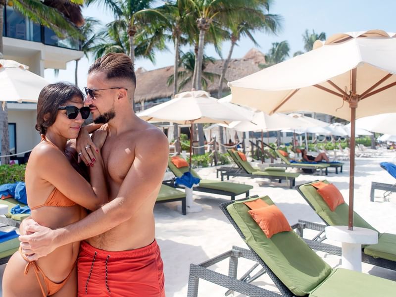 Couple embracing on Playa Coco Beach