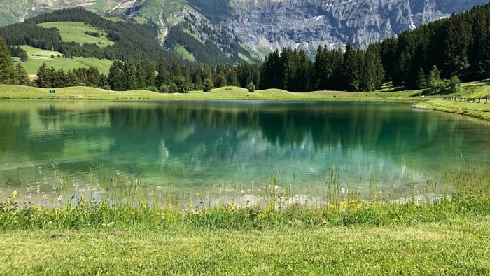 Beautiful lake with mountains near The Original Hotels