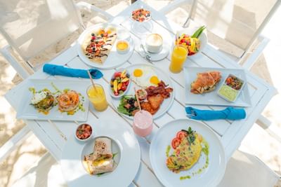 Breakfast served with fresh juice on the deck at Passions on the Beach