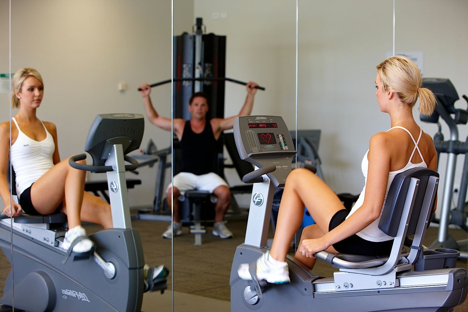 People exercising in the gym at Central Coast resort