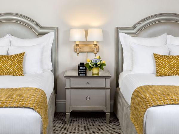 Double Beds with furniture at Warwick Melrose Dallas