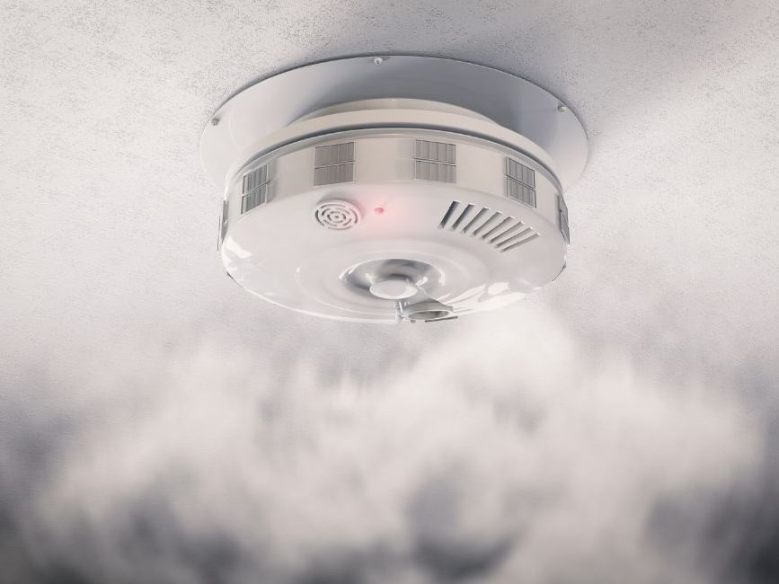 Close-up of a smoke detector used at Brady Apartment Hotel Hardware Lane