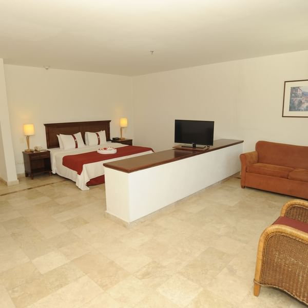 Bed & furniture in Master Suite at Gamma Hotels