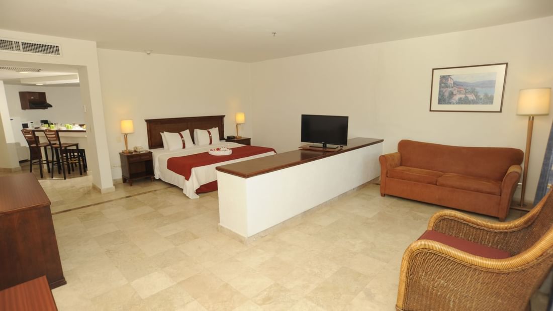 Bed & furniture in Master Suite at Gamma Hotels