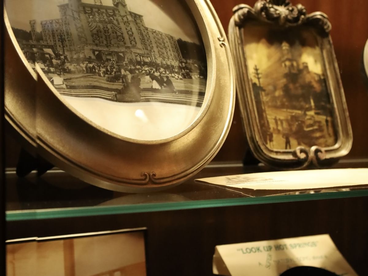 Historical framed photographs on display showcasing the local heritage at Arlington Resort Hotel & Spa