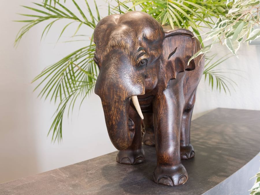 Close up on a wooden elephant kept at Hotel Nevers Centre Gare