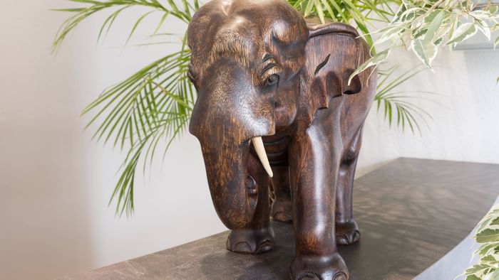 Close up on a wooden elephant kept at Hotel Nevers Centre Gare