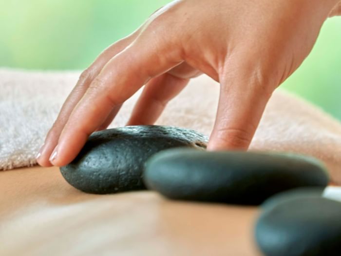 A person having a massage treatment in a spa at Terra Nostra Garden Hotel one of the Terra Nostra spa