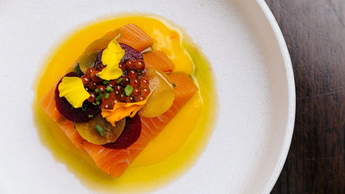 Gourmet dish with salmon, beetroot and roe served in Atlantic Restaurant at Crown Hotel Melbourne
