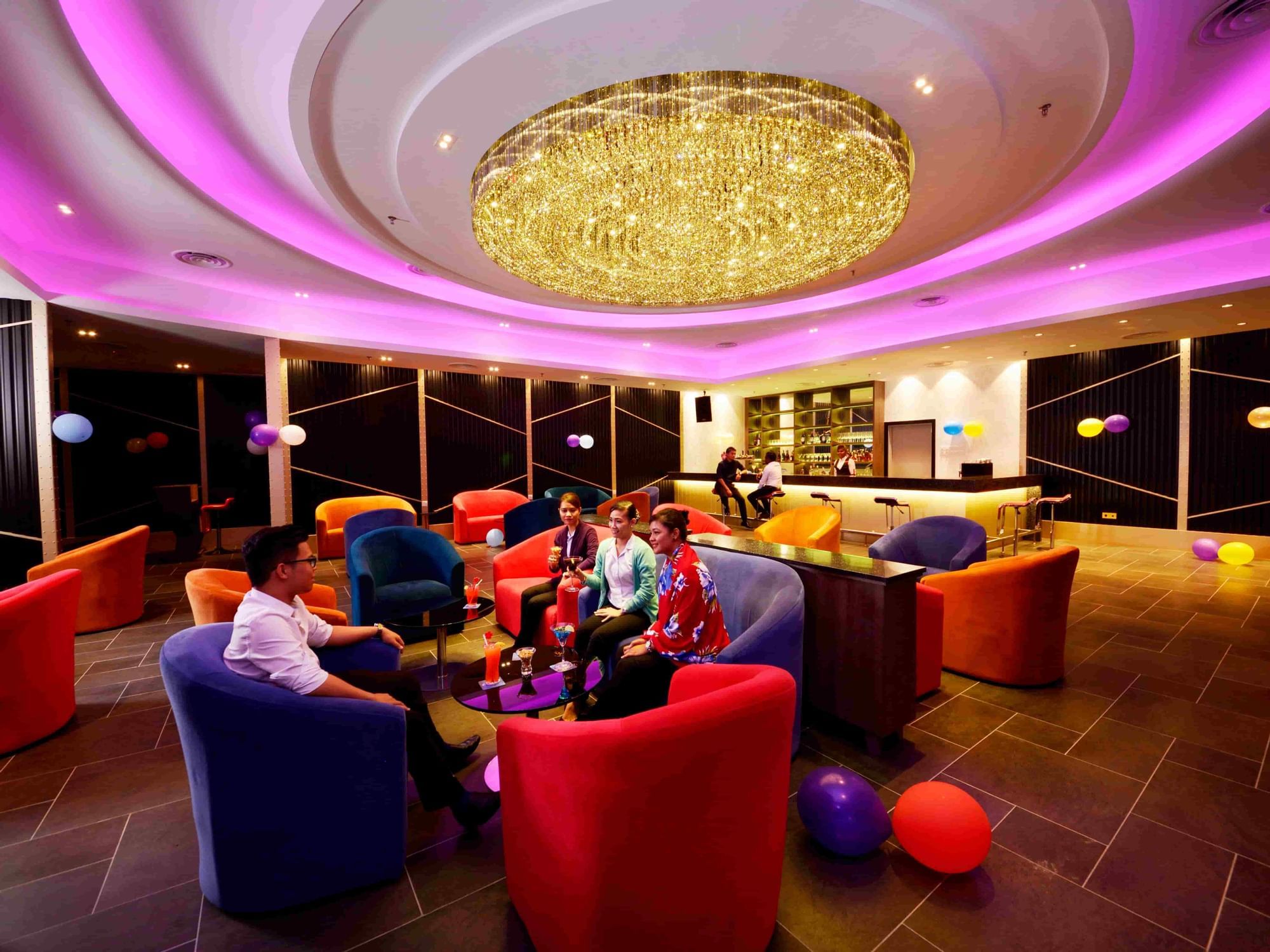 Customers enjoying happy hour at Satellite Bar, Lexis Hibiscus® Port Dickson