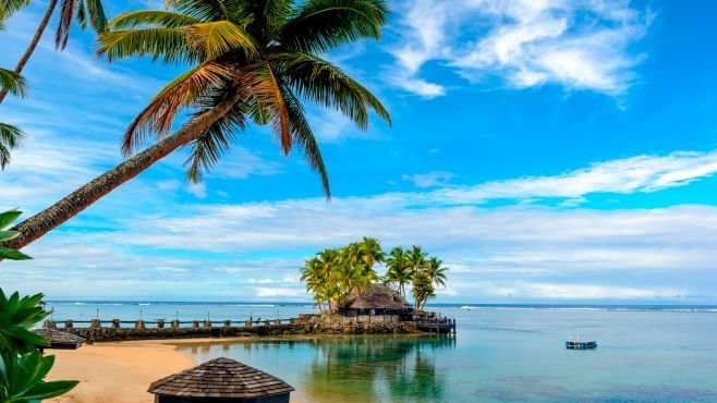 Landscape view of a deck by the beach at Warwick Fiji