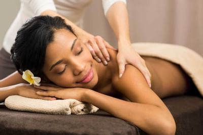 woman receiving back massage