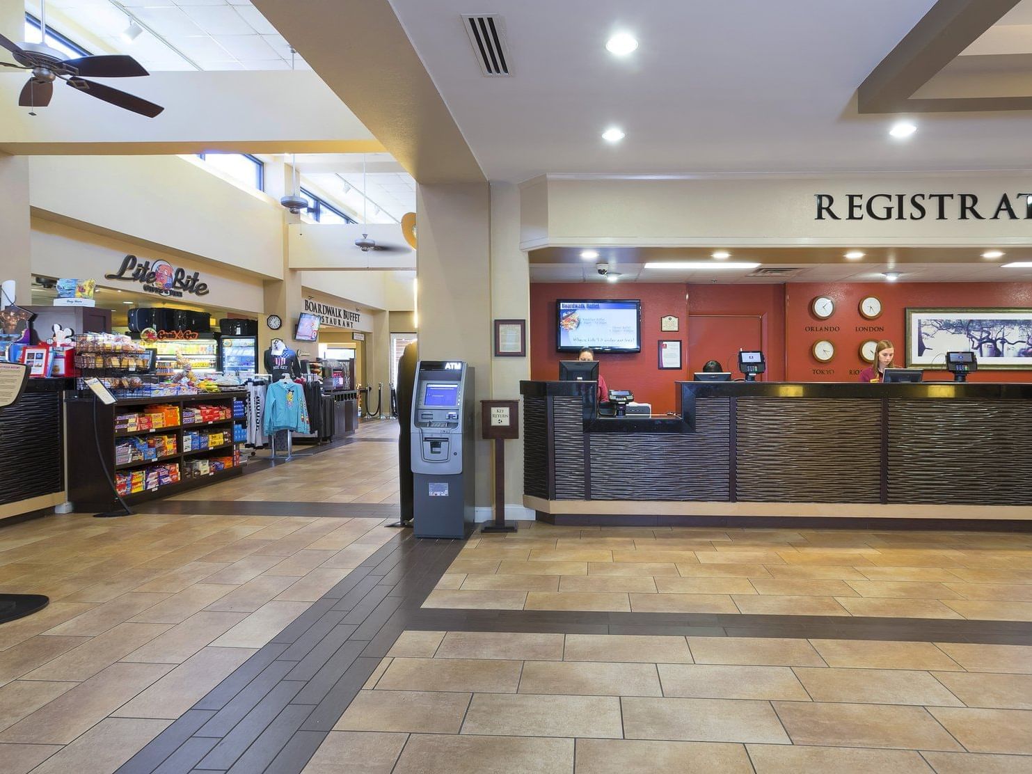 Lobby with registration desk, Life Lite sign, ATM, and 