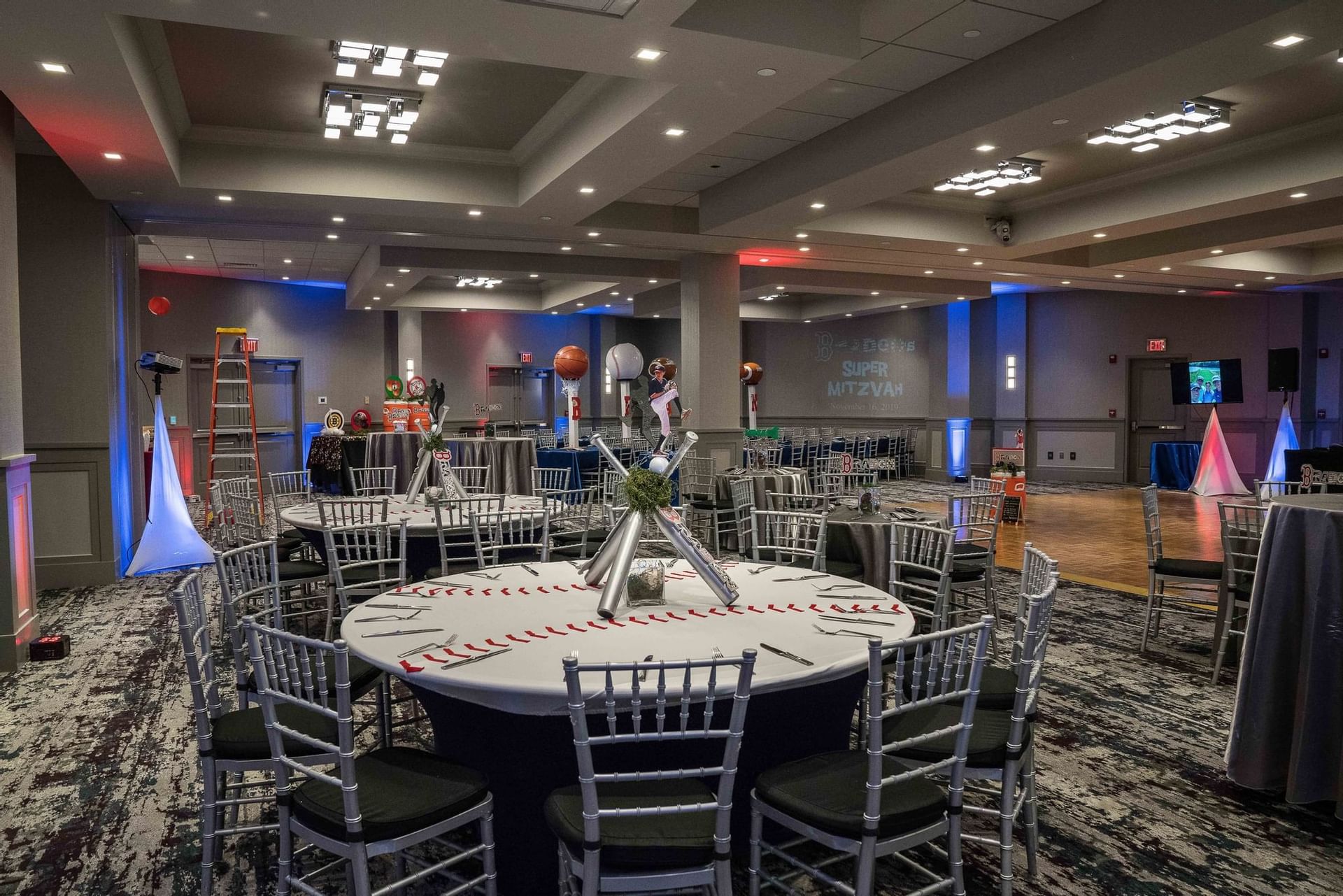 banquet room with baseball themed centerpieces on tables