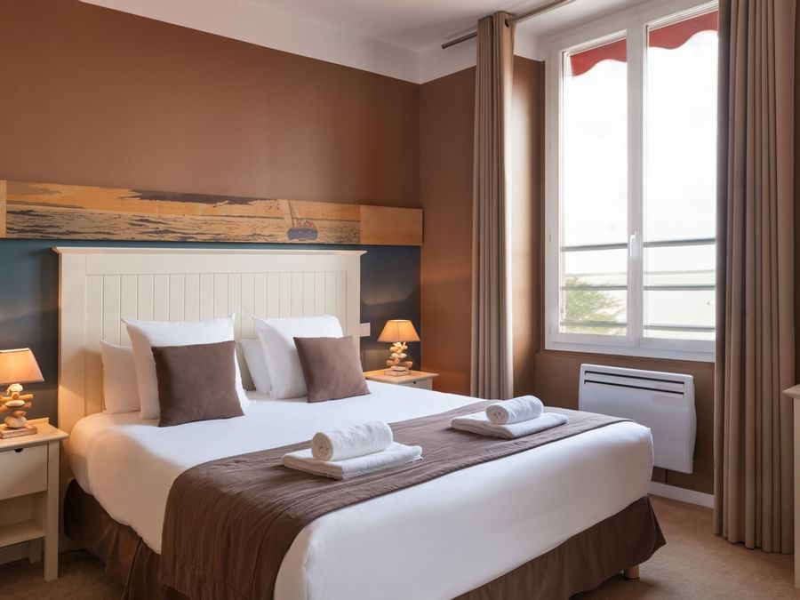 King bed in Hotel de La Plage at The Original Hotels