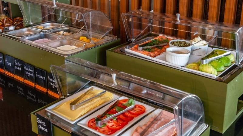cold meats, tomatoes, avocado, salmon capers and cheeses for buffet breakfast mercure kooindah waters