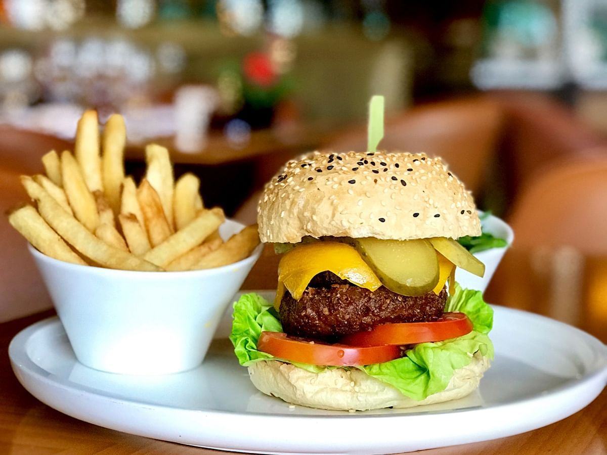 A burger served with french fries