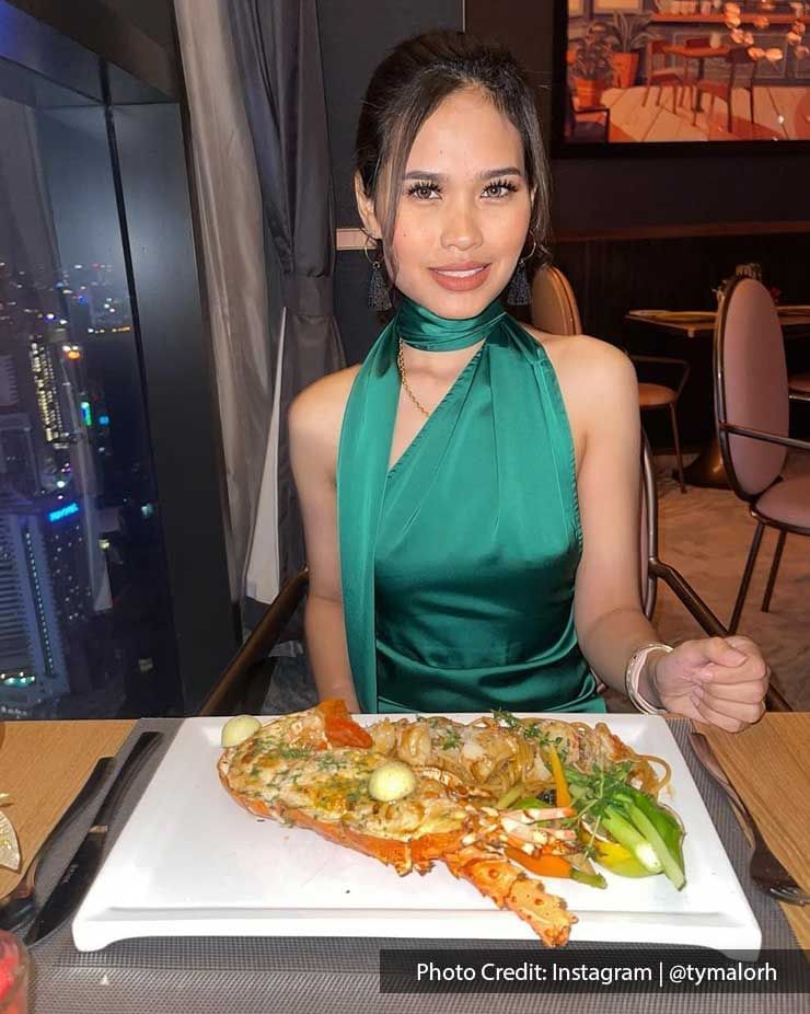 Woman with romantic dinner Imperial Lexis KL