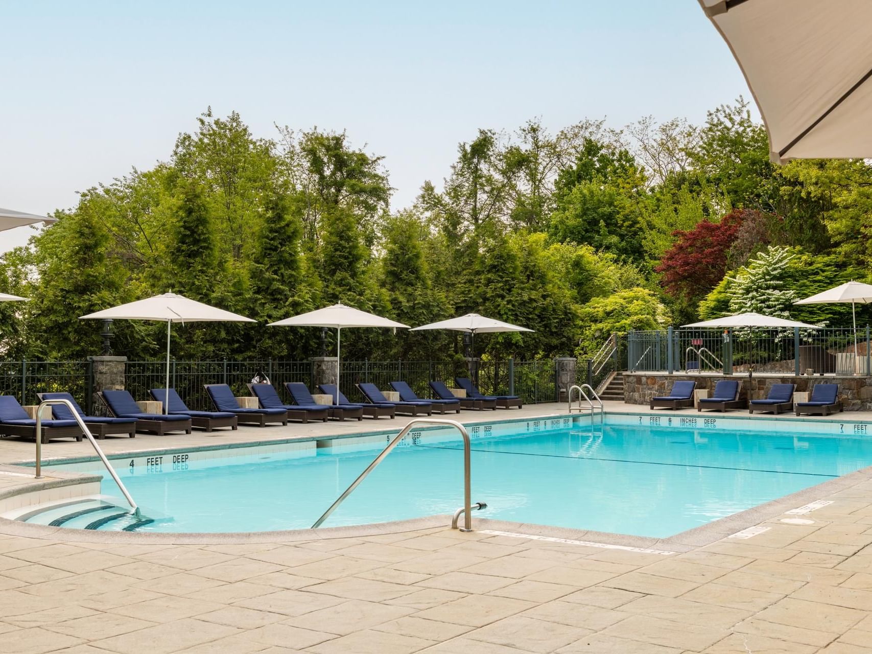 Outdoor Seasonal Pool with pool beds at Castle Hotel and Spa