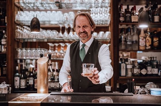 Cup of whisky served at Hotel Palace München Bar