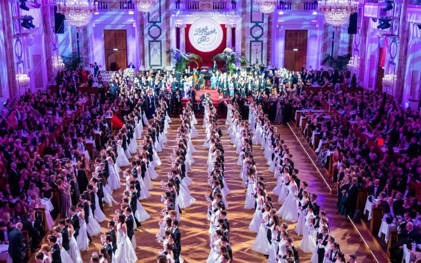 Opening of the traditional Vienna Confectioners’ Ball (Zuckerbäckerball) with debutantes, their partners and a beautifully decorated ballroom.