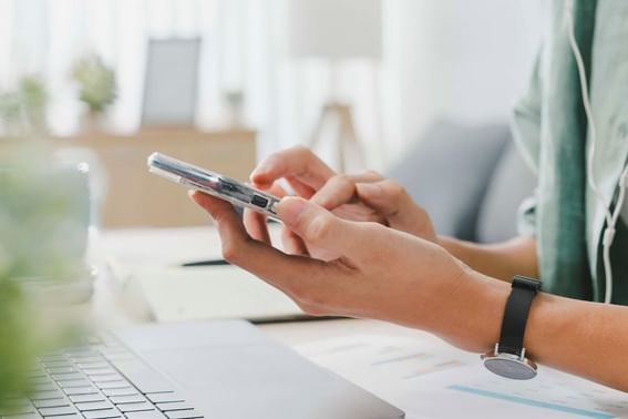 Man is using a smartphone at Park Hotel Hong Kong