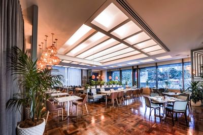 Dining tables in Croft Restaurant at Amora Hotel Sydney