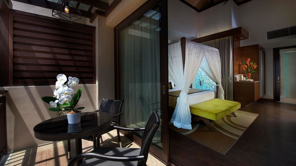 Lake Villa with canopy bed, private terrace, and modern amenities at The Banjaran Hotsprings Retreat, Ipoh.