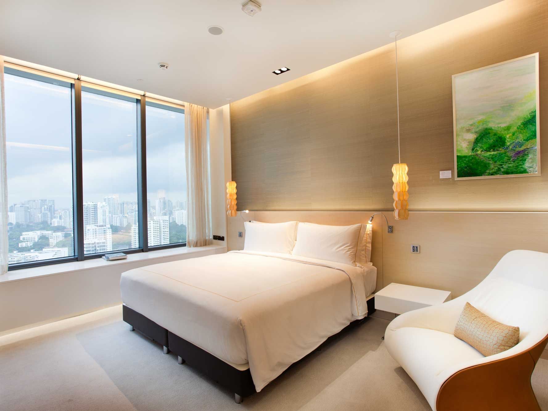 Interior of The Peony Villa bedroom at One Farrer Hotel