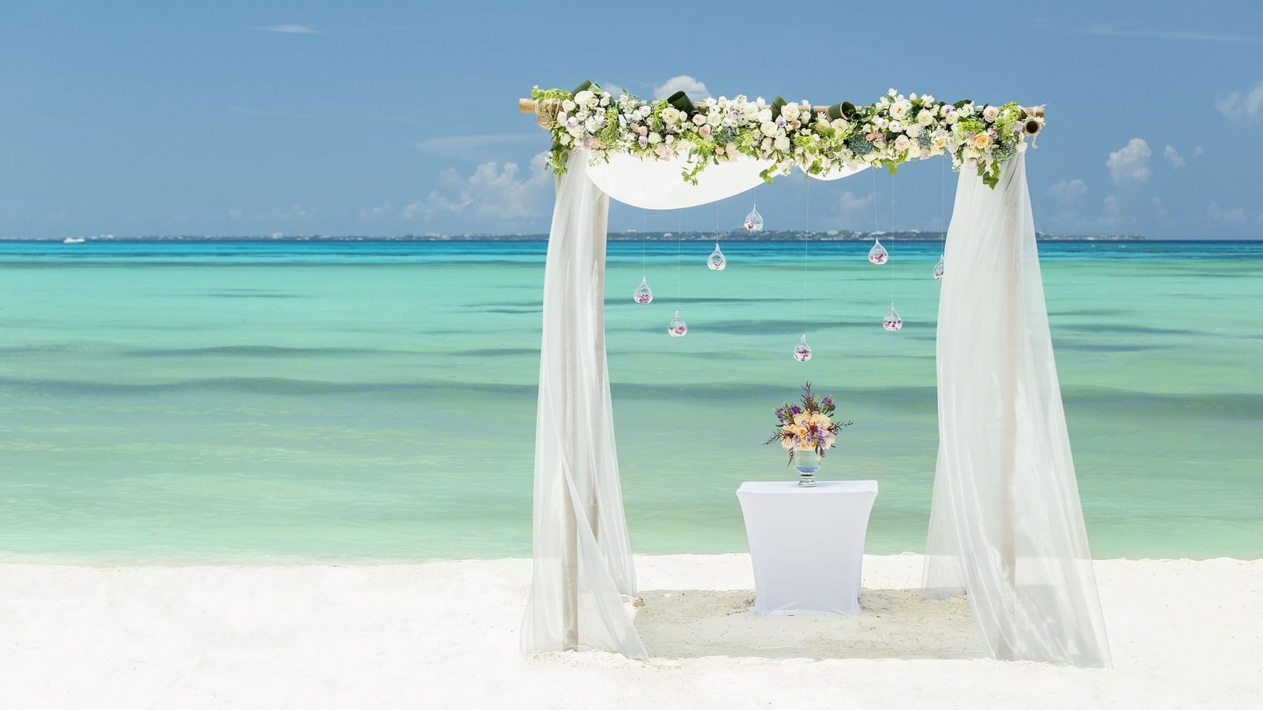 Wedding arch on the beach near Grand Fiesta Americana