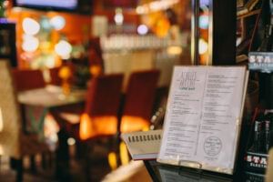 Close-up of menu in Achilles Art Café near Rosen Inn Universal